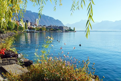 Montreux and mountains in background with Lake Geneva in foreground